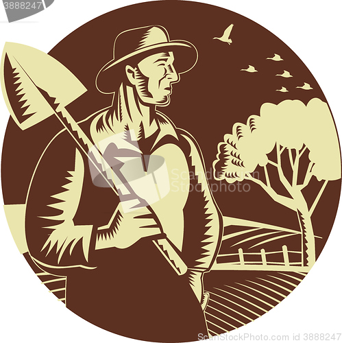 Image of Organic Farmer Holding Shovel Farm Circle Woodcut