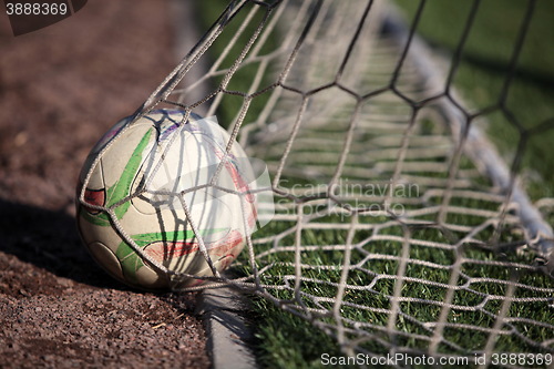 Image of soccer ball in net