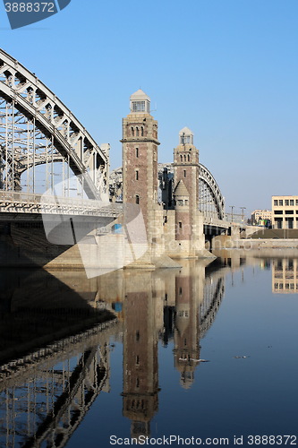 Image of  Old Bridge reflected in water