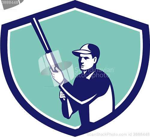 Image of Hunter Holding Shotgun Rifle Crest Retro