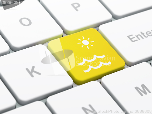 Image of Travel concept: Beach on computer keyboard background
