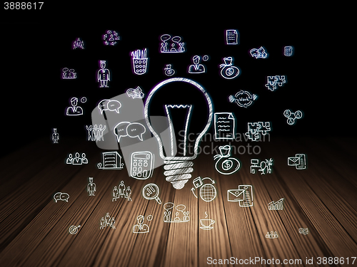 Image of Business concept: Light Bulb in grunge dark room