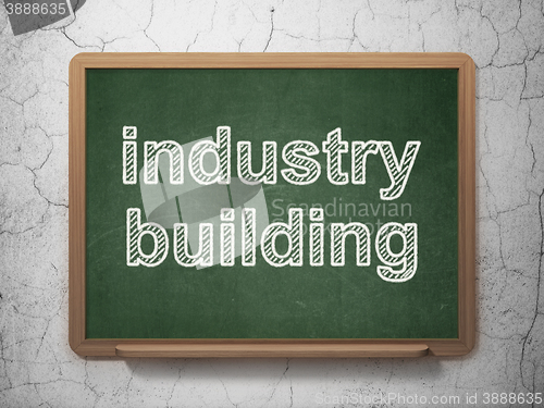 Image of Industry concept: Industry Building on chalkboard background