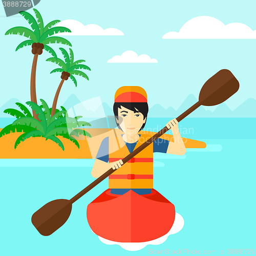 Image of Man riding in canoe.