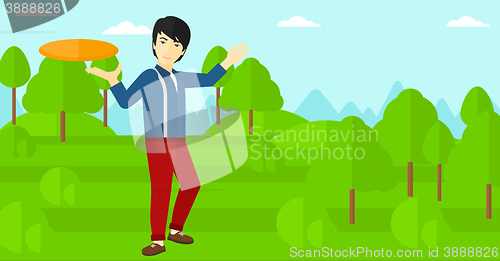 Image of Man playing flying disc.
