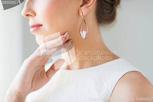 Image of close up of beautiful woman face with earring