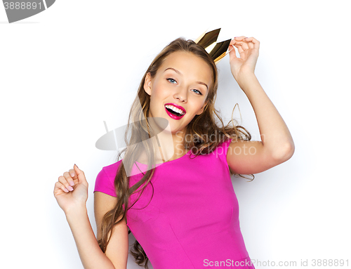 Image of happy young woman or teen girl in pink dress