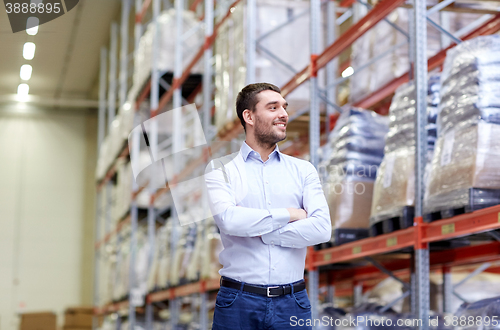 Image of happy man at warehouse