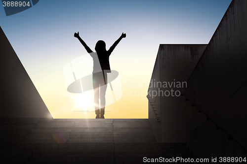 Image of silhouette of woman or girl showing thumbs up