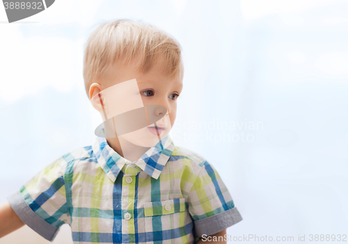 Image of happy little baby boy at home