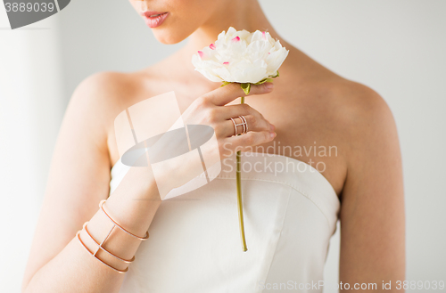 Image of close up of beautiful woman with ring and bracelet