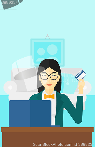 Image of Woman making purchases online.