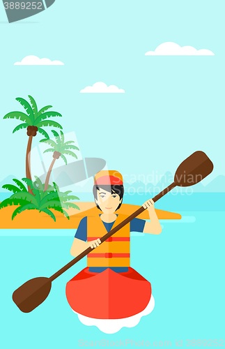 Image of Man riding in canoe.