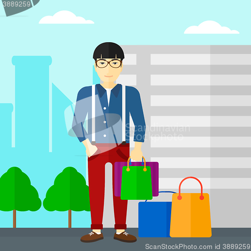 Image of Buyer with shopping bags.