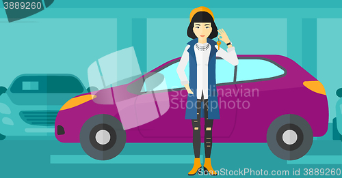 Image of Woman holding keys from new car.