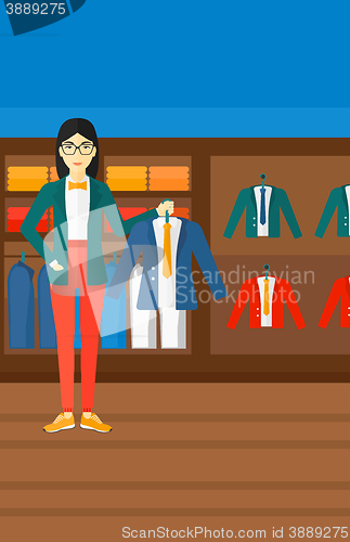 Image of Woman holding jacket.