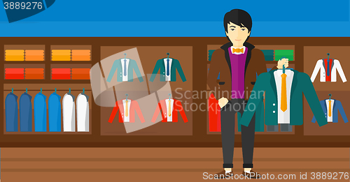 Image of Man holding jacket.