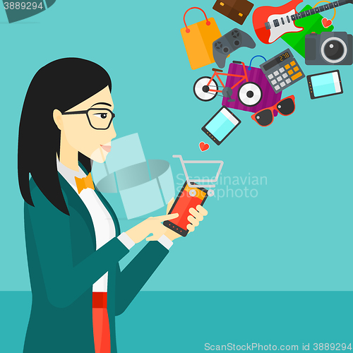 Image of Woman making purchases online.