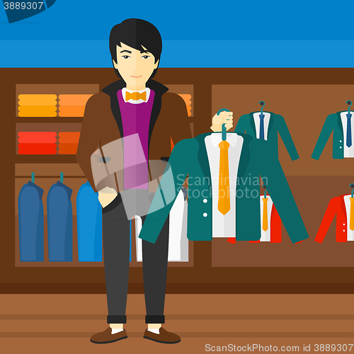Image of Man holding jacket.