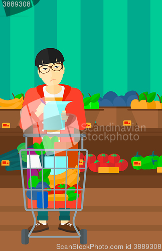 Image of Man with shopping list.