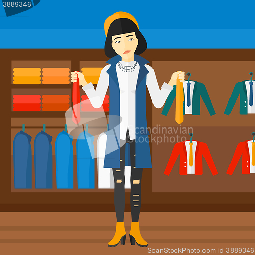 Image of Customer choosing neckties.
