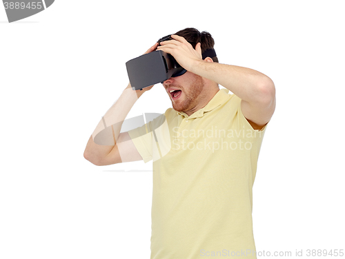 Image of happy man in virtual reality headset or 3d glasses