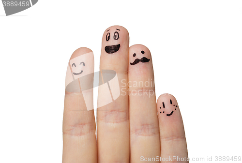 Image of close up of fingers with smiley faces