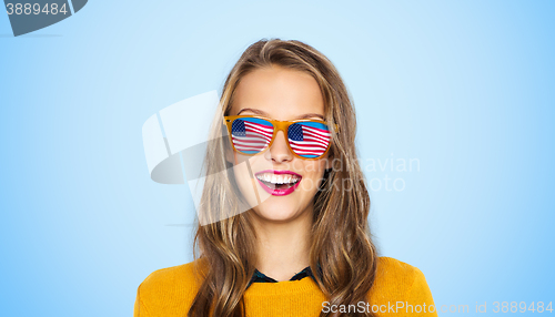 Image of happy young woman or teen girl in sunglasses