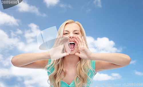 Image of angry young woman or teenage girl shouting