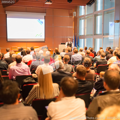 Image of Speaker at Business Conference and Presentation.