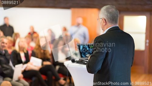 Image of Speaker at Business Conference and Presentation.