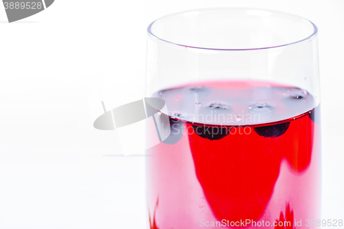 Image of Glass of aronia juice with berries