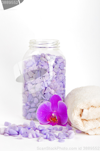 Image of Salt, towel and orchid