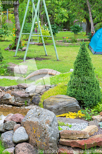 Image of Alpine garden with green grass