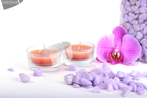 Image of Salt, spoon, towel and orchid