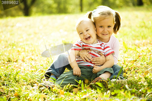 Image of Children are playing in autumn park