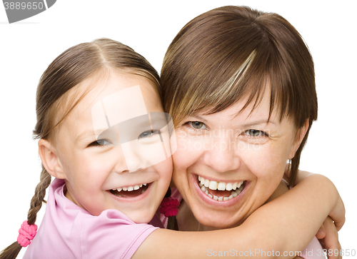 Image of Portrait of a happy mother with her daughter