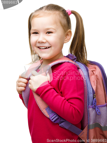 Image of Portrait of a cute little schoolgirl with backpack