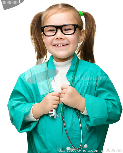 Image of Cute little girl is playing doctor