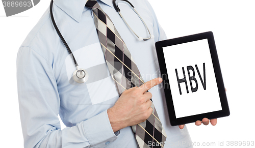 Image of Doctor holding tablet - HBV