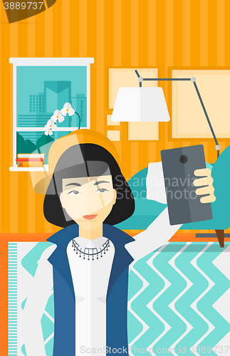 Image of Woman making selfie.