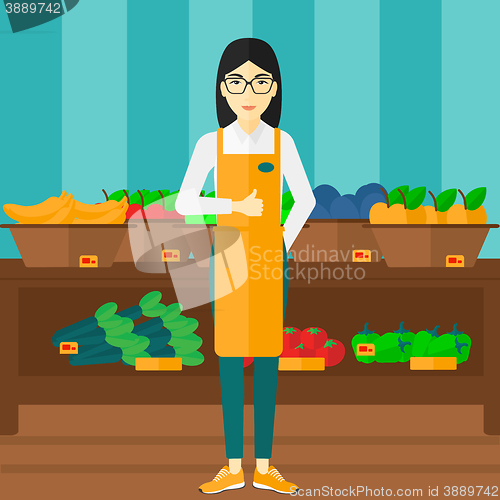 Image of Friendly supermarket worker.