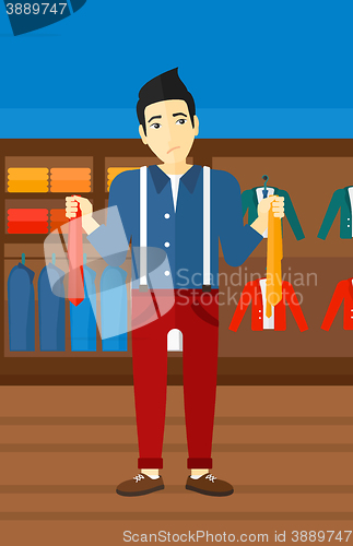 Image of Customer choosing neckties.