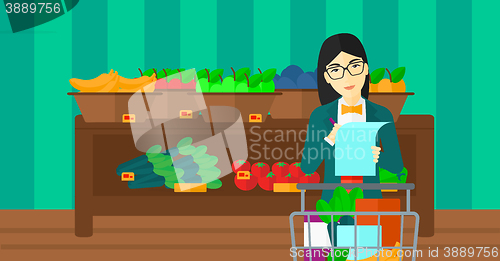 Image of Woman with shopping list.