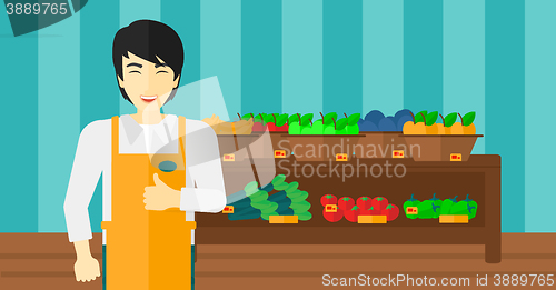 Image of Friendly supermarket worker.