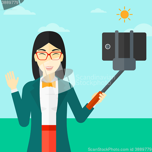 Image of Woman making selfie.