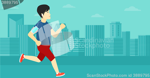 Image of Man jogging with earphones and smartphone.