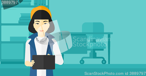Image of Woman using tablet computer.