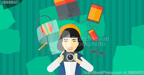 Image of Woman holding camera.