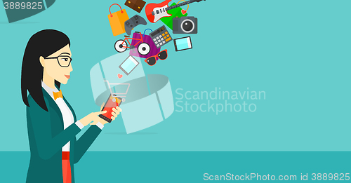 Image of Woman making purchases online.